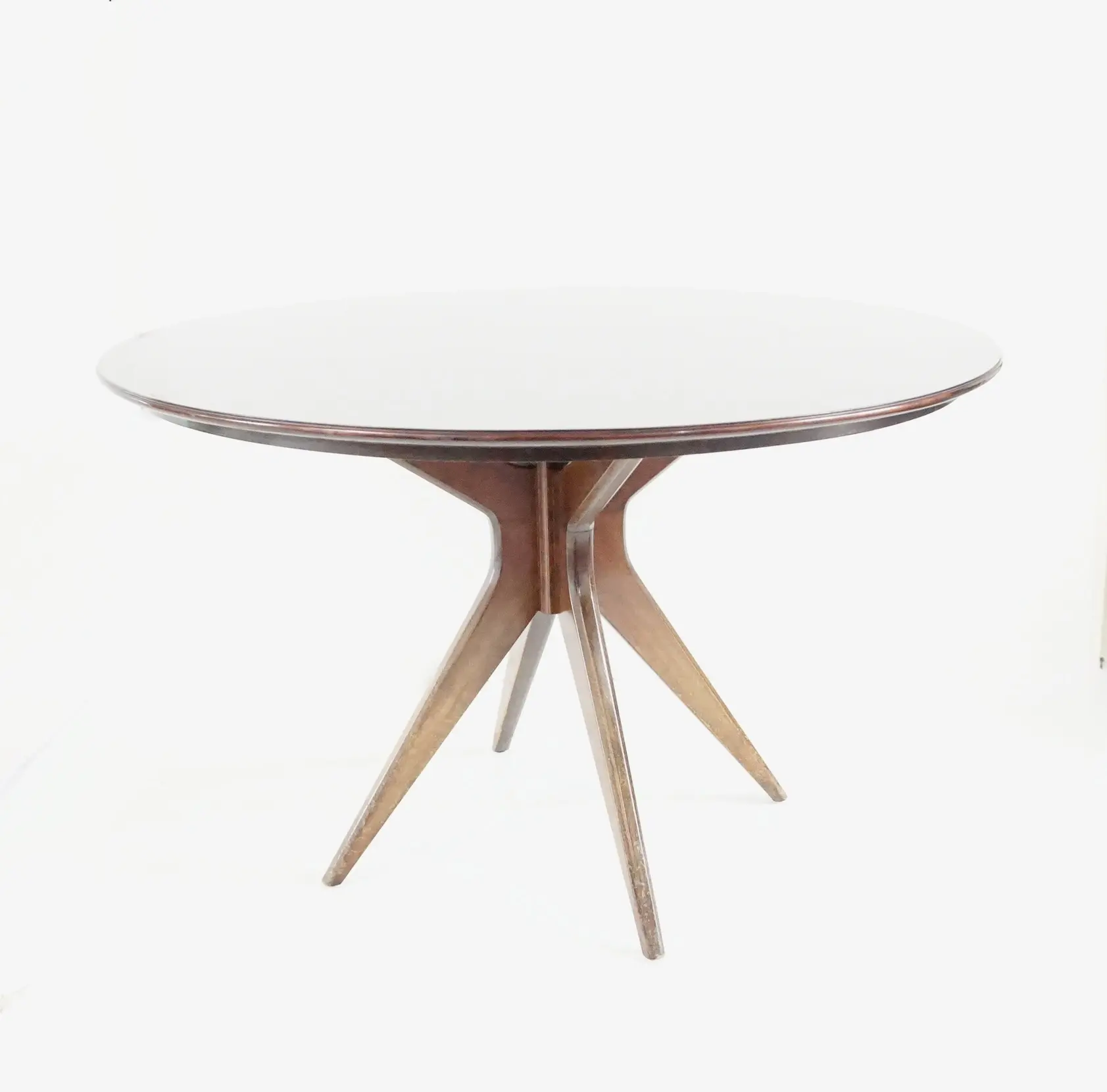 Osvaldo Borsani round dining table, walnut, four feet, circa 1951 — Osvaldo Borsani