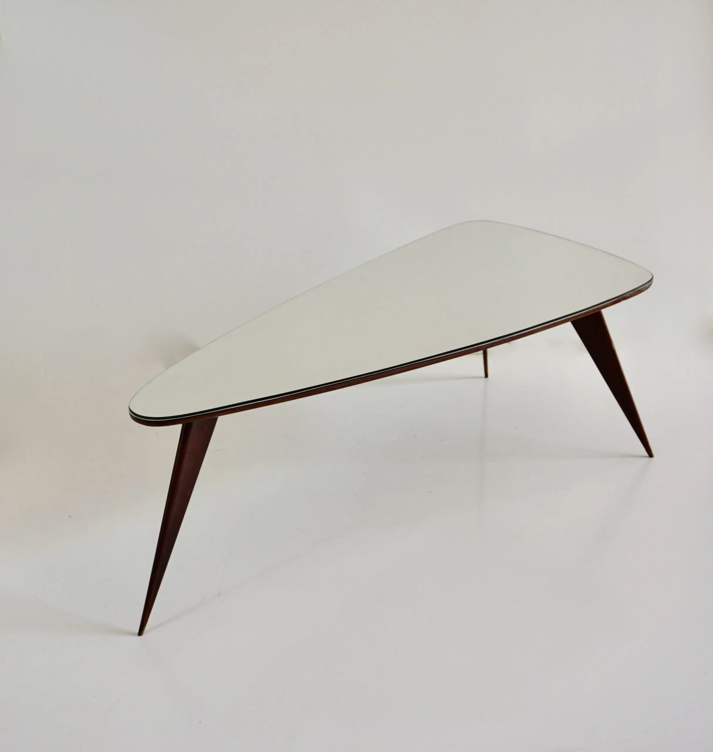 large Cesare Lacca walnut coffee table, three feet irregular shape, mirrored top — photo 10