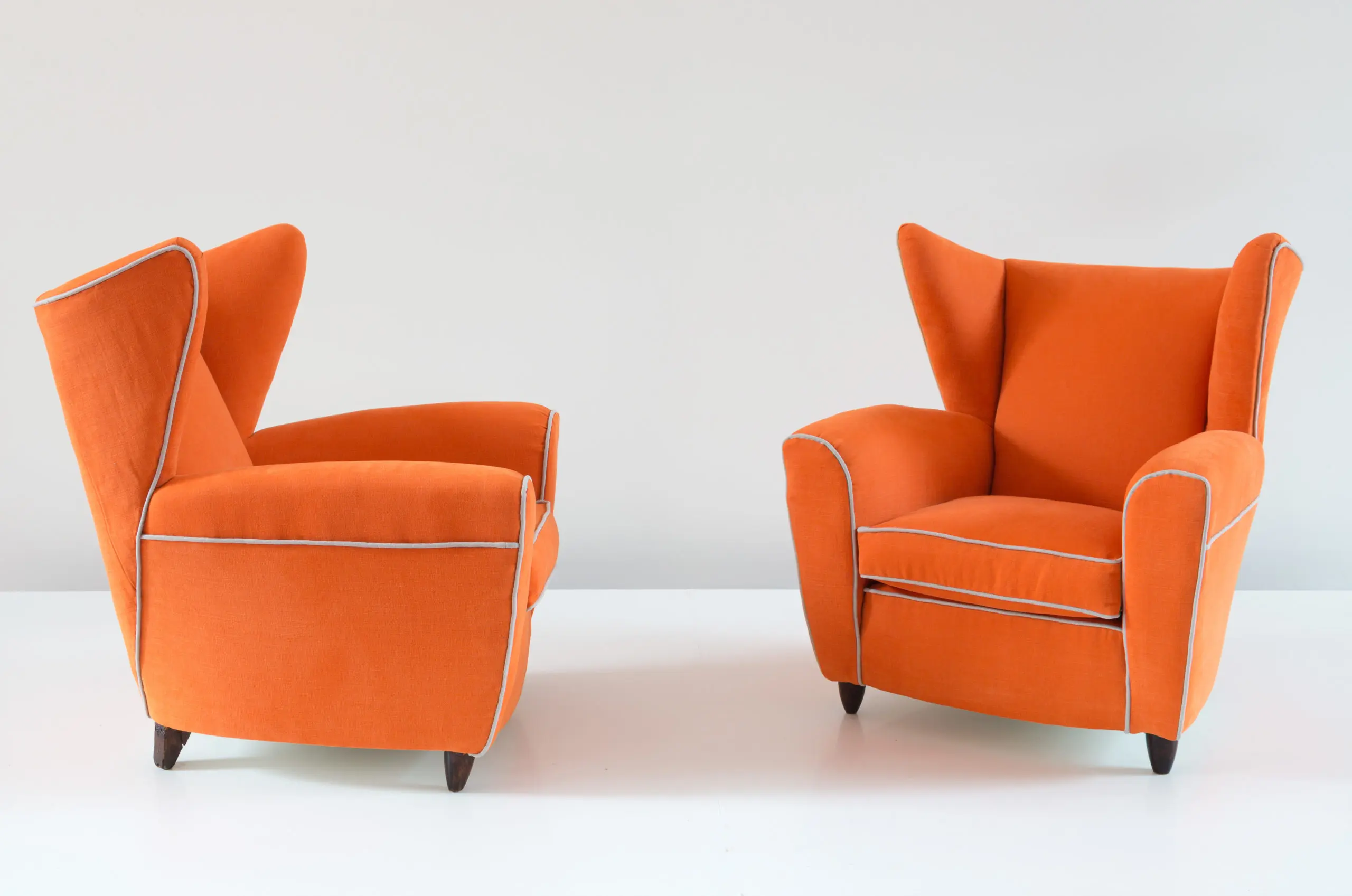 Pair of orange large wingback armchairs,att. to Melchiorre Bega, 1952 — image 2