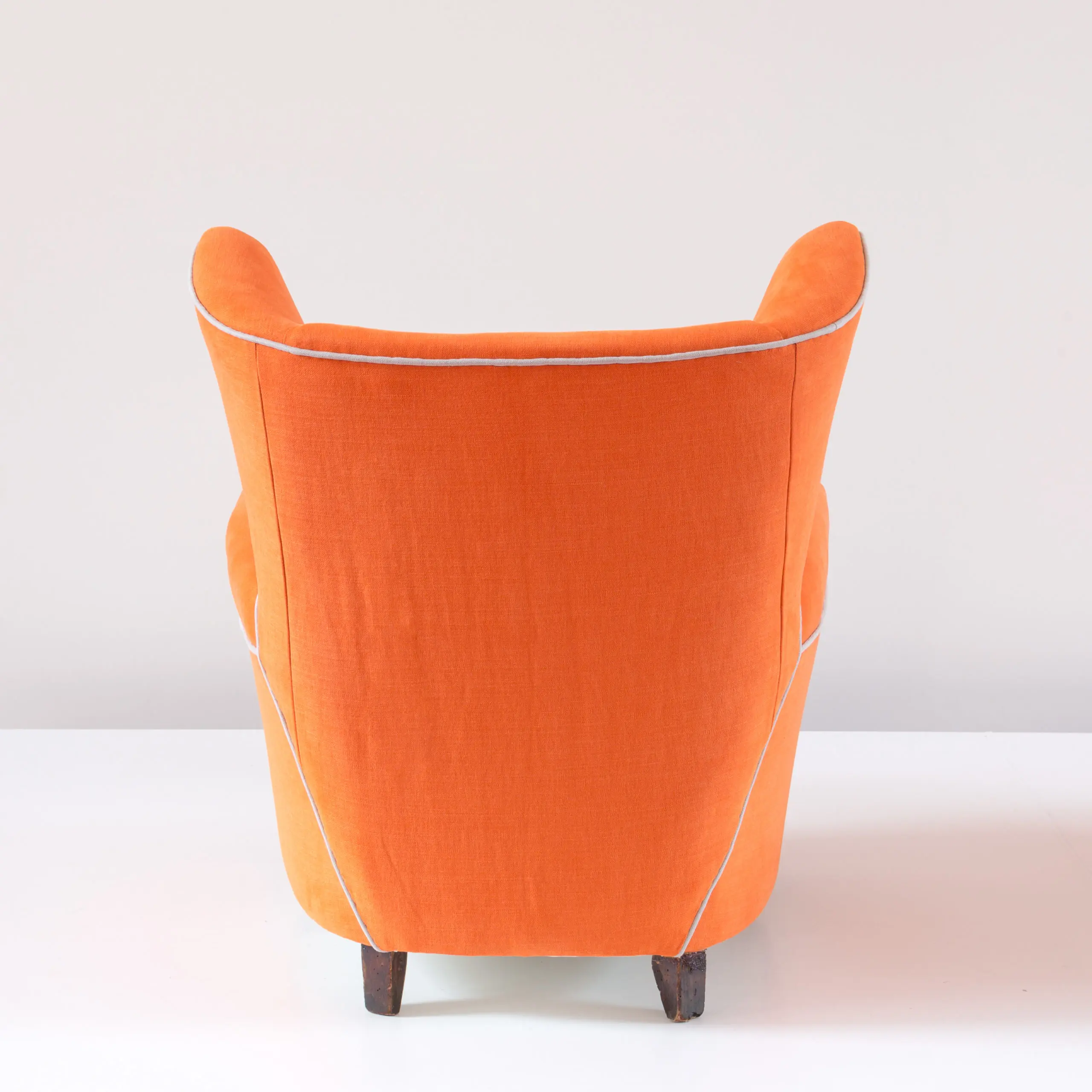 Pair of orange large wingback armchairs,att. to Melchiorre Bega, 1952 — image 3
