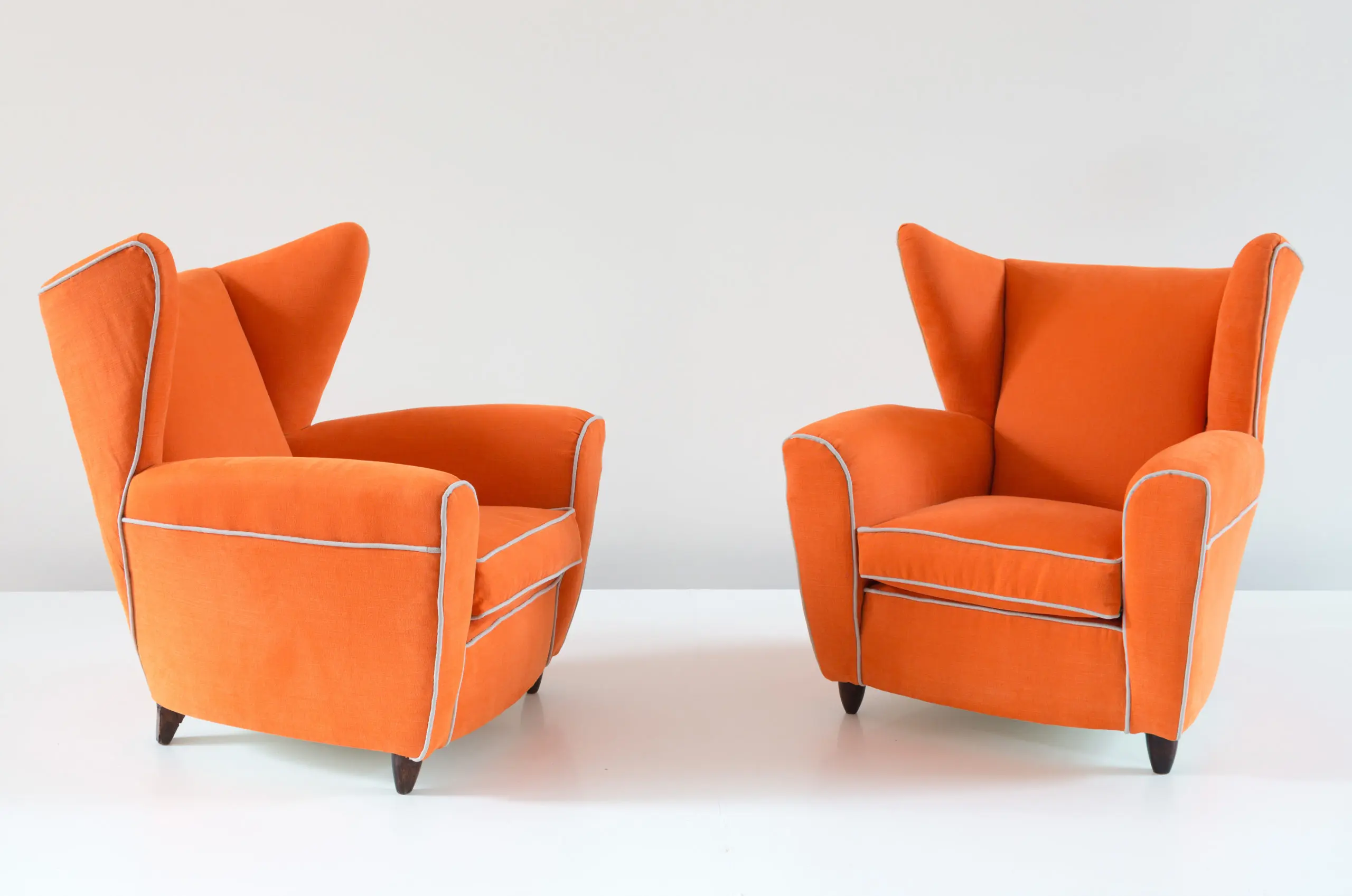 Pair of orange large wingback armchairs,att. to Melchiorre Bega, 1952 — photo 5